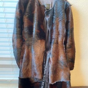Very lightly used mink Donna karan coat.